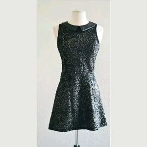 Black swirl pattern sleeveless dress